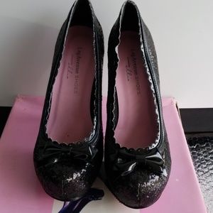 Black shiny high heels